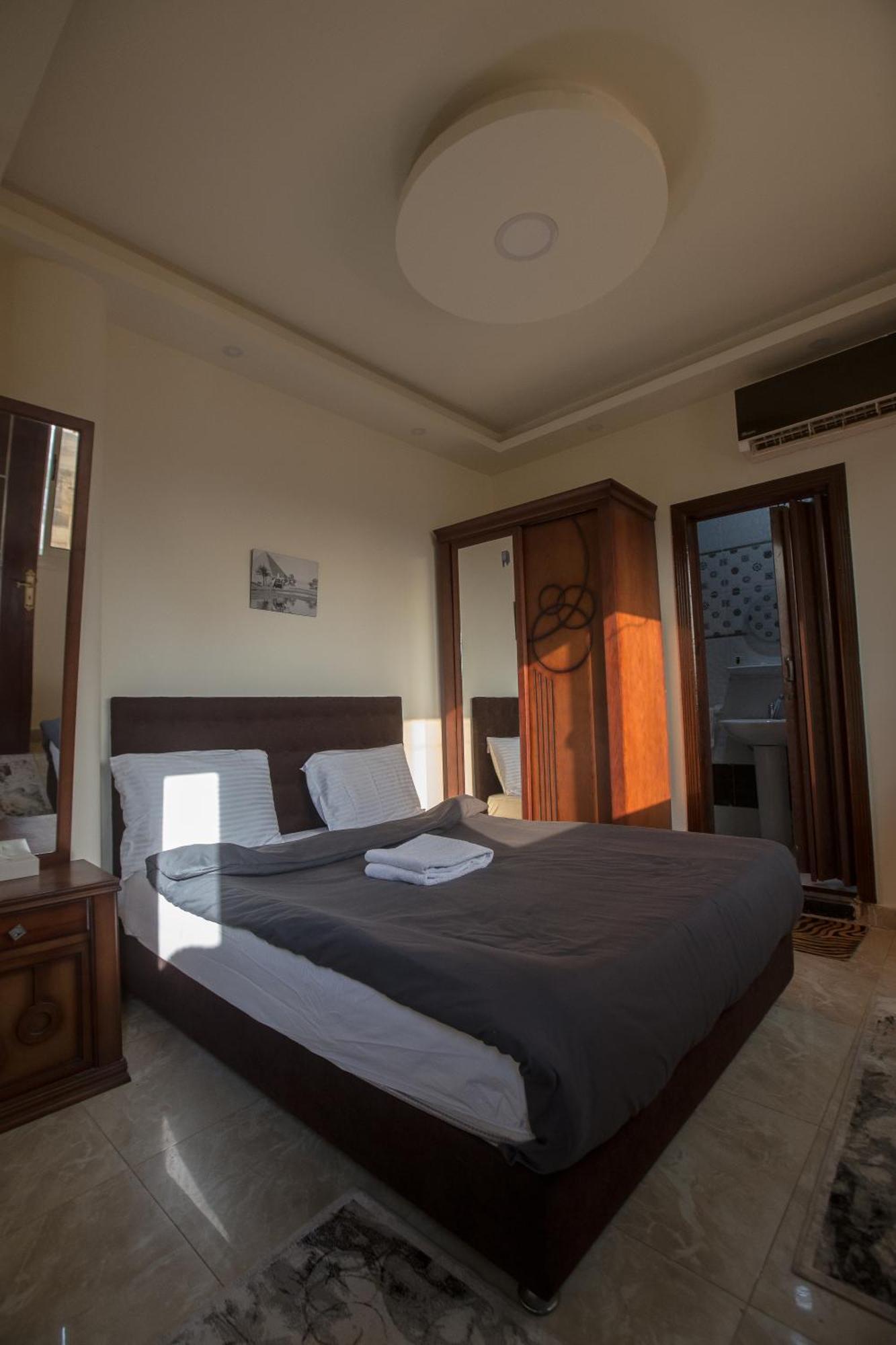 Cairo Pyramids View Inn Kafret el-Gabal Quarto foto